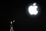 Tim Cook, chief executive officer of Apple Inc., waves after speaking during an event at the Steve Jobs Theater in Cupertino, California on&nbsp;March 25.