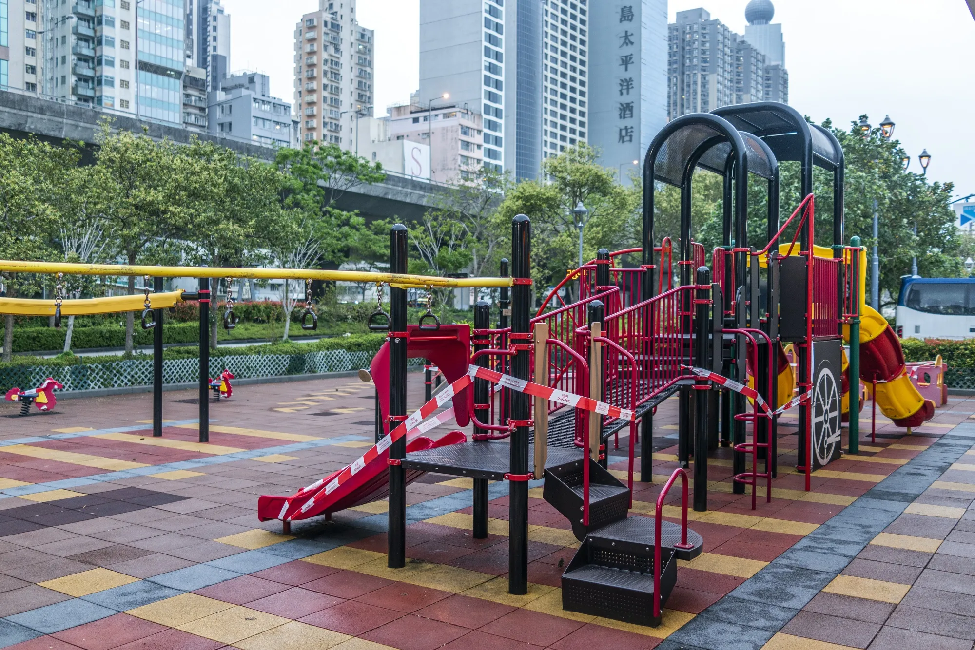 Barrier tape is wrapped around a children's playground in Hong Kong, March 29.