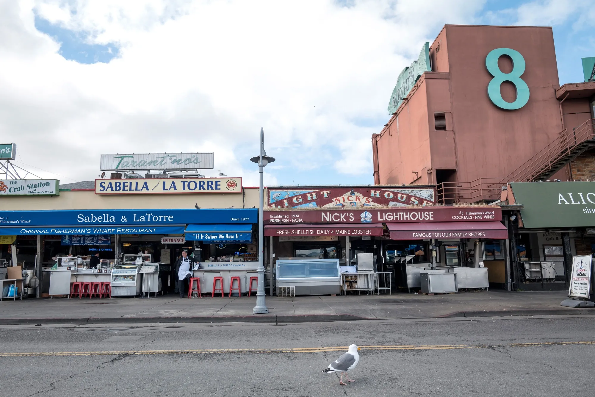 A restaurant employee waits for customers in San Francisco, California, on March 16.
