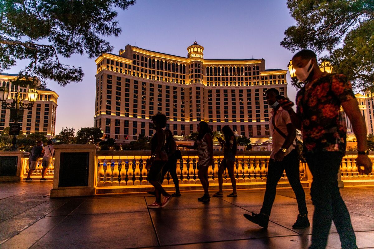 bloomberg.com - Christopher Palmeri - Vegas Tourism Hit, Online Rivals Put Caesars and MGM in Play