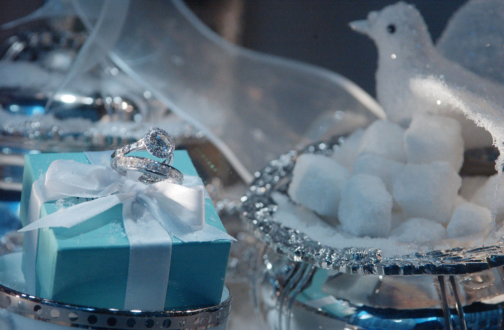 A set of diamond rings sits on display in a window of Tiffany &amp; Co. store in New York on January 7, 2003. Tiffany &amp; Co., the largest U.S. luxury jewelry retailer, reduced its fourth-quarter profit forecast after holiday-season sales were less than expected in the U.S. and in Japan, its two largest markets.
