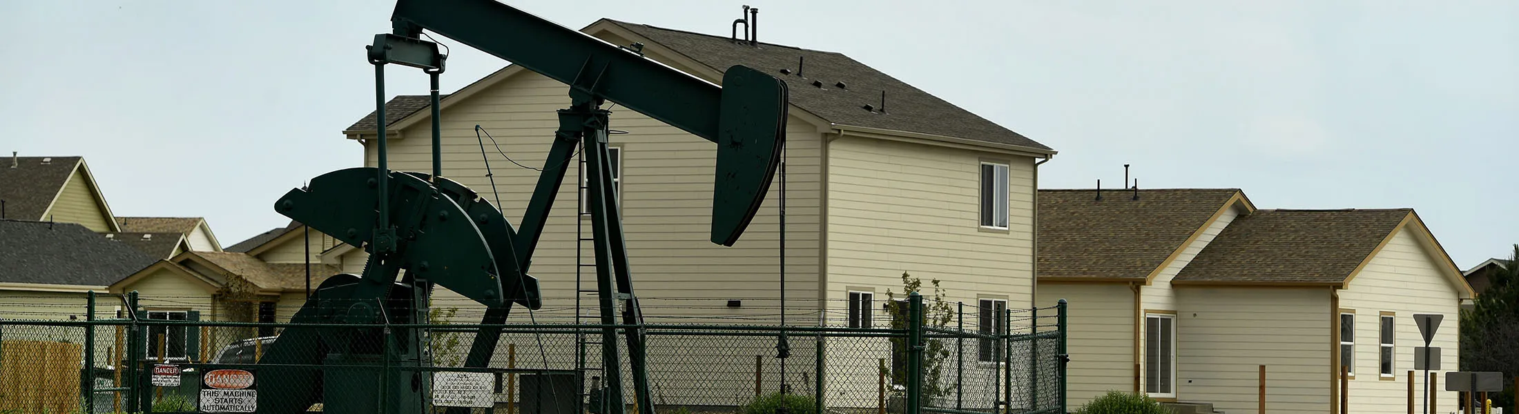 DACONO, CO - JUNE 7: A roundabout on Flying Circle Blvd was constructed to go around an oil derrick that sits inside a housing development  on June 7, 2017 in Dacono, Colorado.  Gas and oil development, exploration and fracking operations are colliding more and more with subdivision and housing developments as the front range continues to grow. (Photo by Helen H. Richardson/The Denver Post via Getty Images)