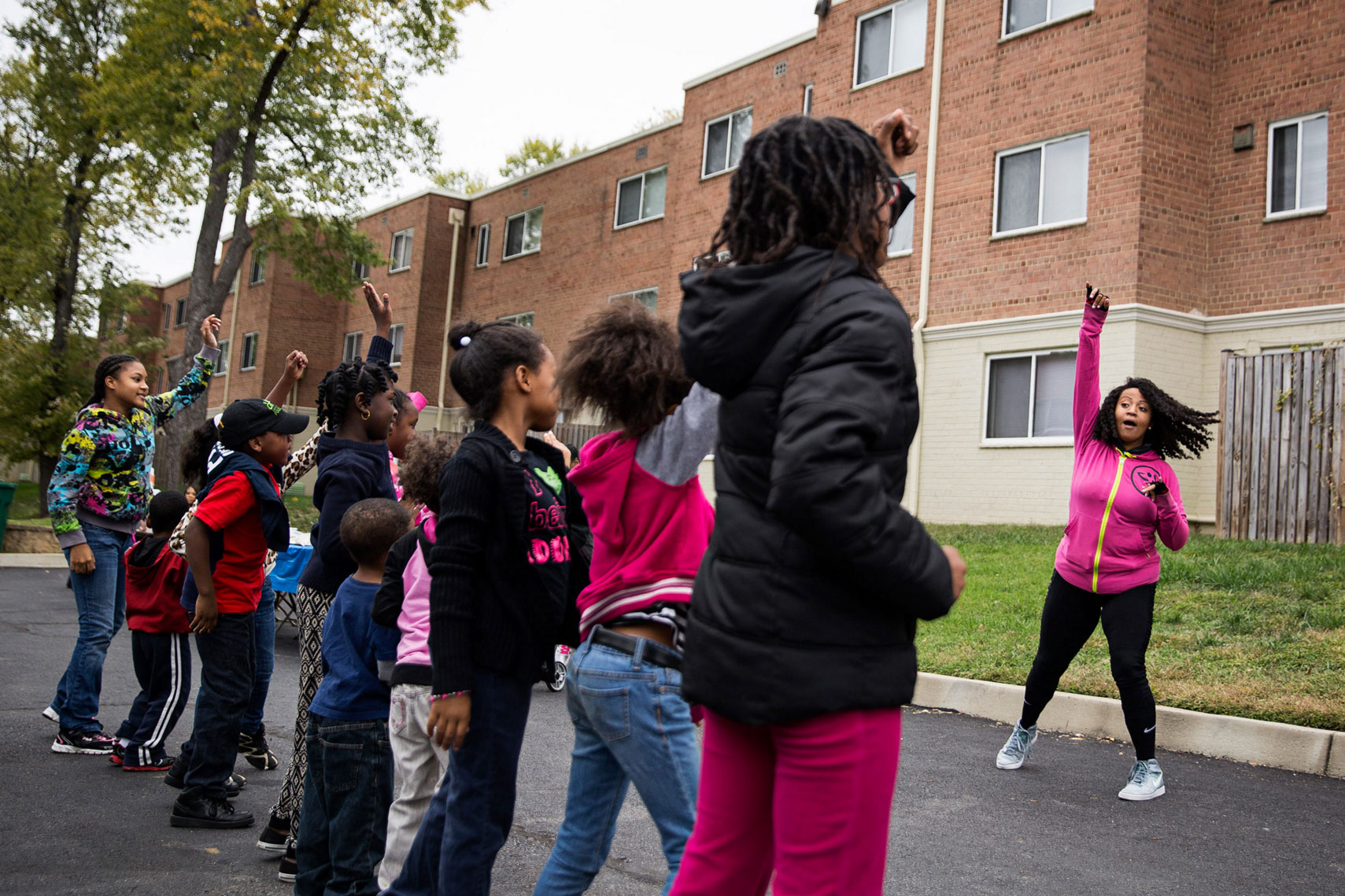 Zumba at a community fair at the Regency Pointe Apartments, a Turner Impact property, in District Heights, Maryland, on Oct. 24.
