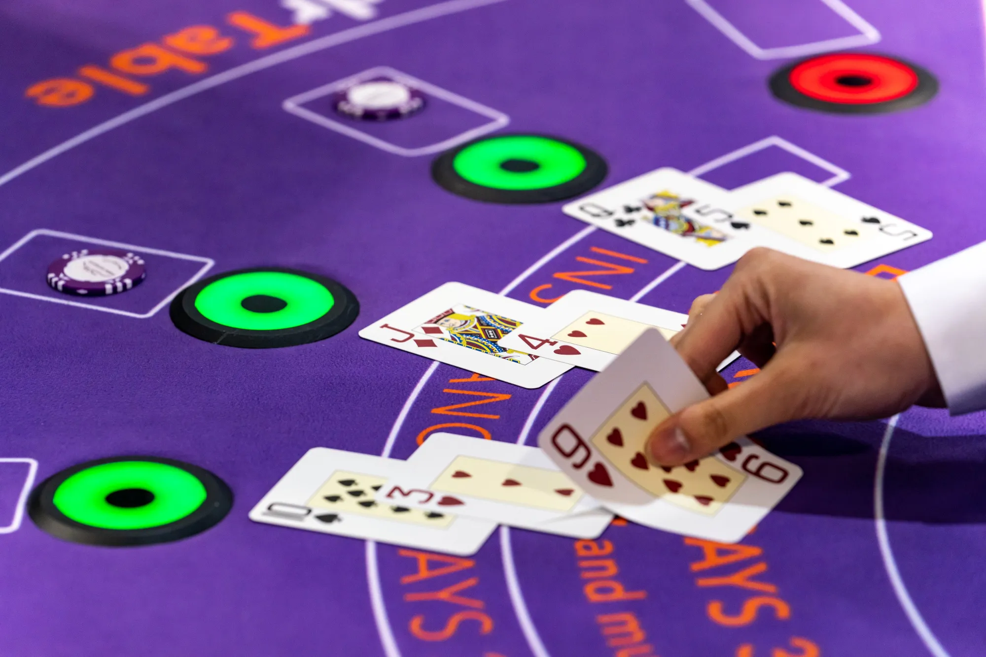 Cards are dealt on a blackjack table at the Global Gaming Expo Asia (G2E Asia) in Macau, China, on Wednesday, May 16, 2018. The expo runs through May 17.