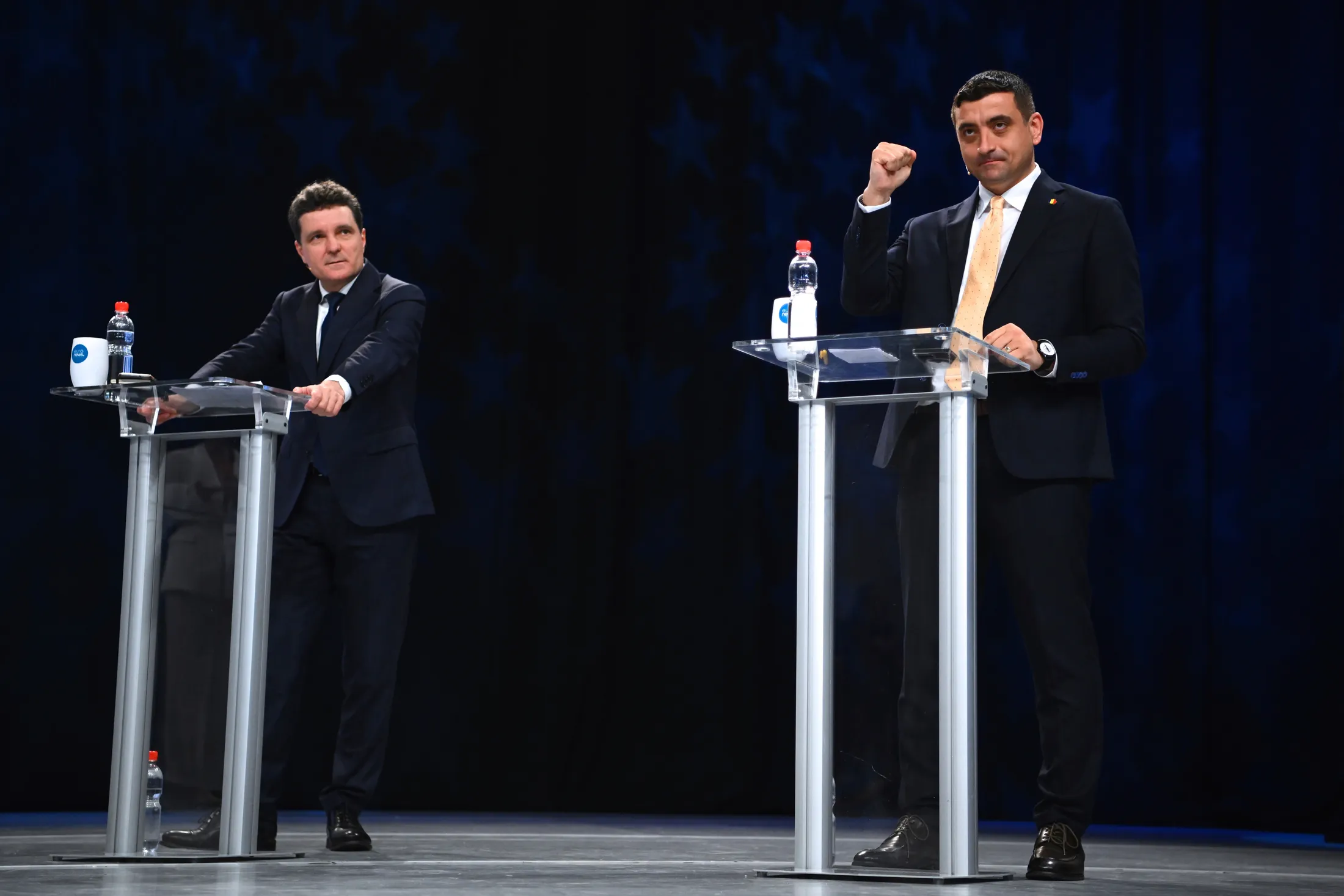 Nicusor Dan, left, and George Simion during an election debate in Bucharest&nbsp;on May 8.