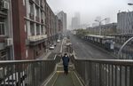 A nearly empty street near the Central Business District in Beijing on Nov. 24.