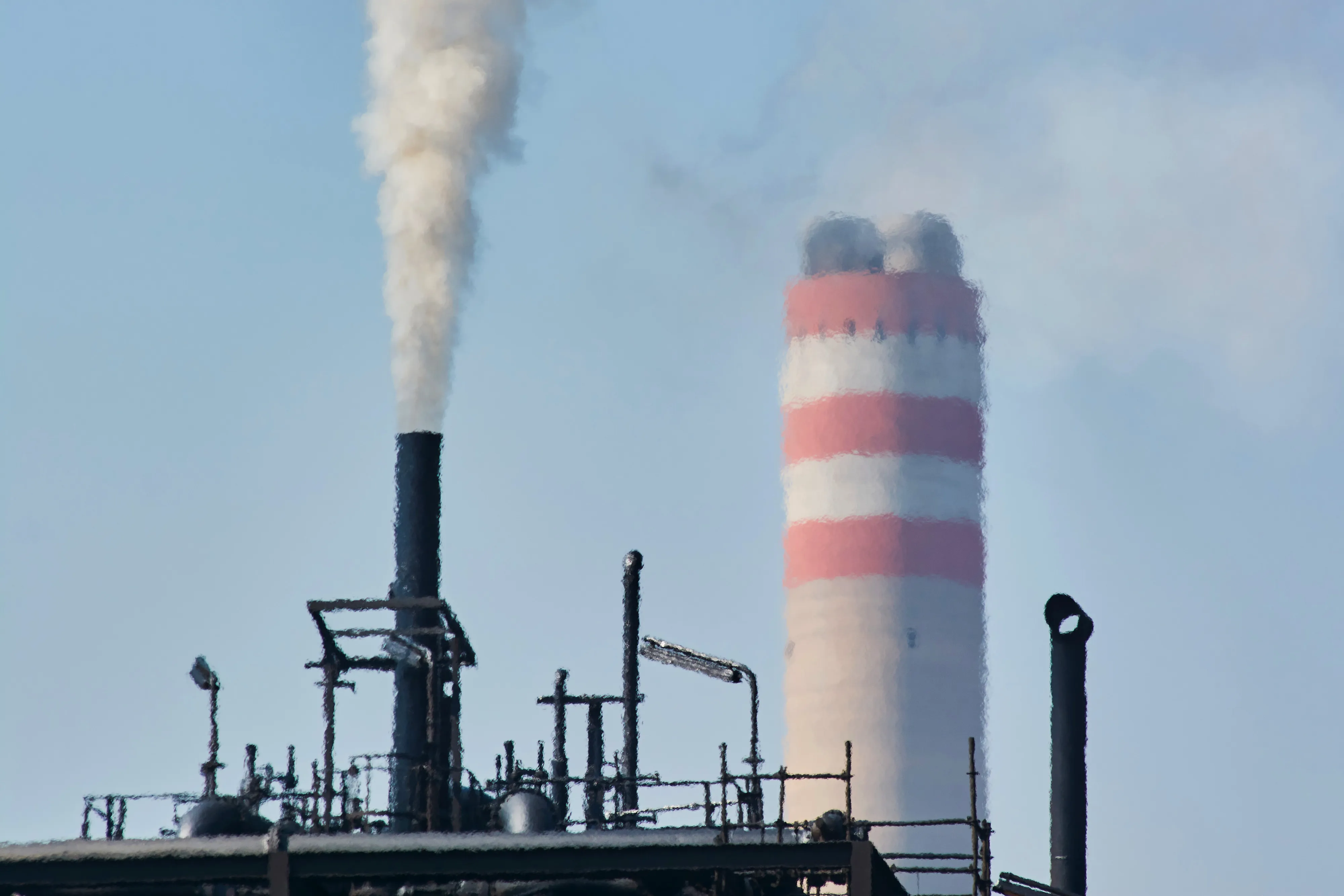 A chimney releases vapor at Sasol Ltd.'s plant&nbsp;in Secunda, Mpumalanga, South Africa.