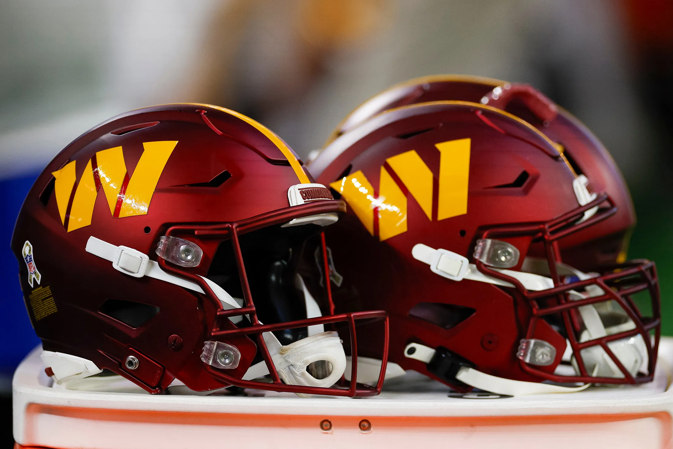 The Washington Commanders logo on team&nbsp;helmets.