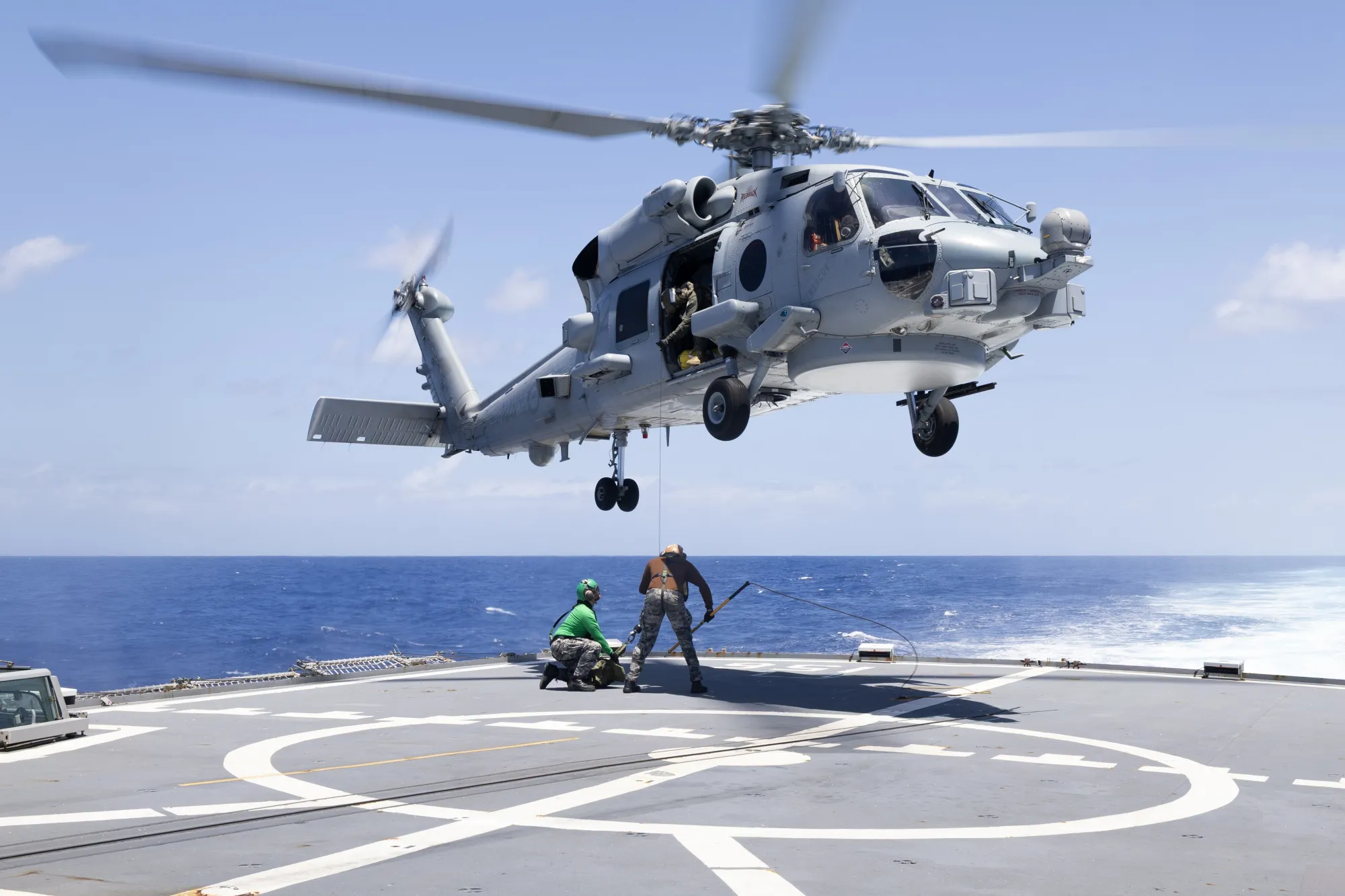 An MH-60R helicopter aboard HMAS Toowoomba while operating at sea during a deployment on Jan. 30.