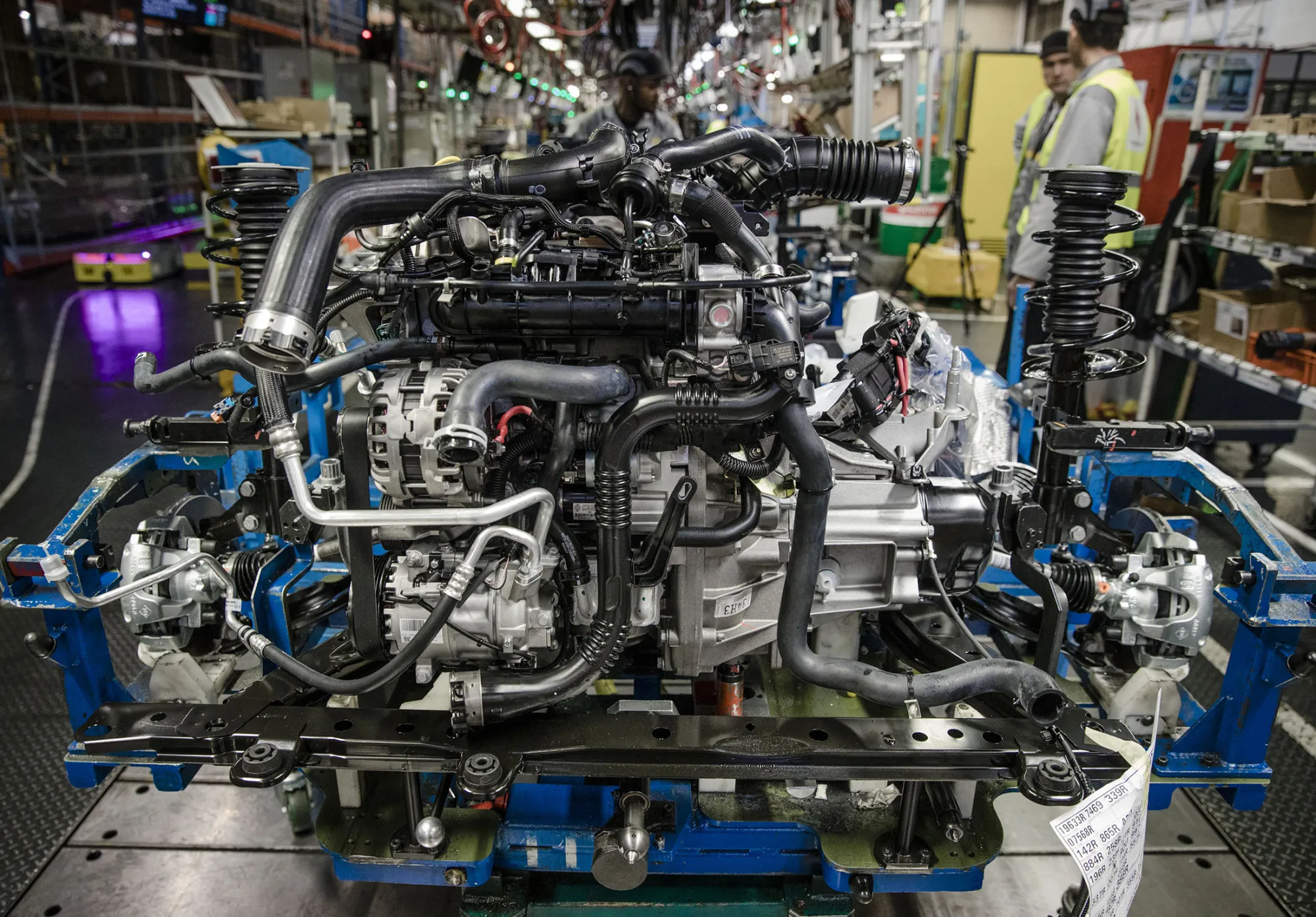 A motor for a Renault Clio automobile sits on the engine assembly line inside the Renault SA factory in Flins, France, on Thursday, Feb. 23, 2017. Carlos Ghosn, one of the auto industry's most celebrated turnaround artists, is relinquishing his CEO role at Nissan Motor Co. and turning over day-to-day control to Hiroto Saikawa as he focuses on strengthening the carmaker's alliance with Renault and Mitsubishi Motors Corp.
