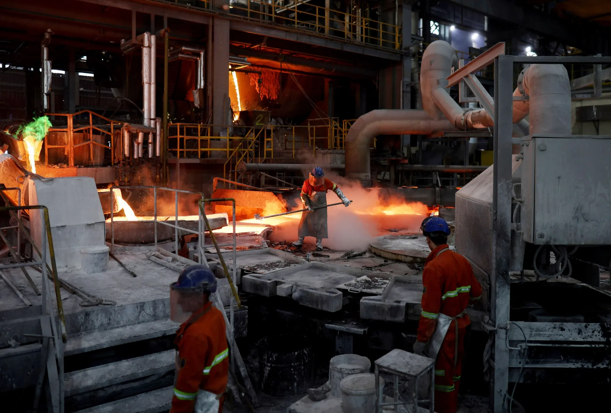 Workers at a copper foundry.