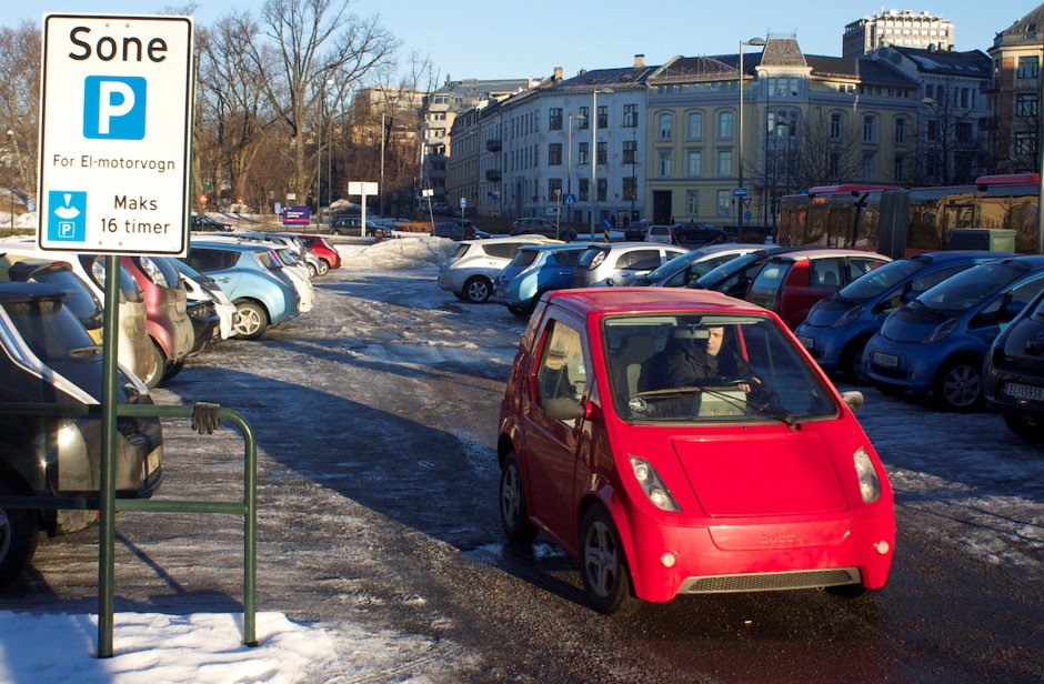 A driver leaves a parking lot in Oslo reserved for electric vehicles.