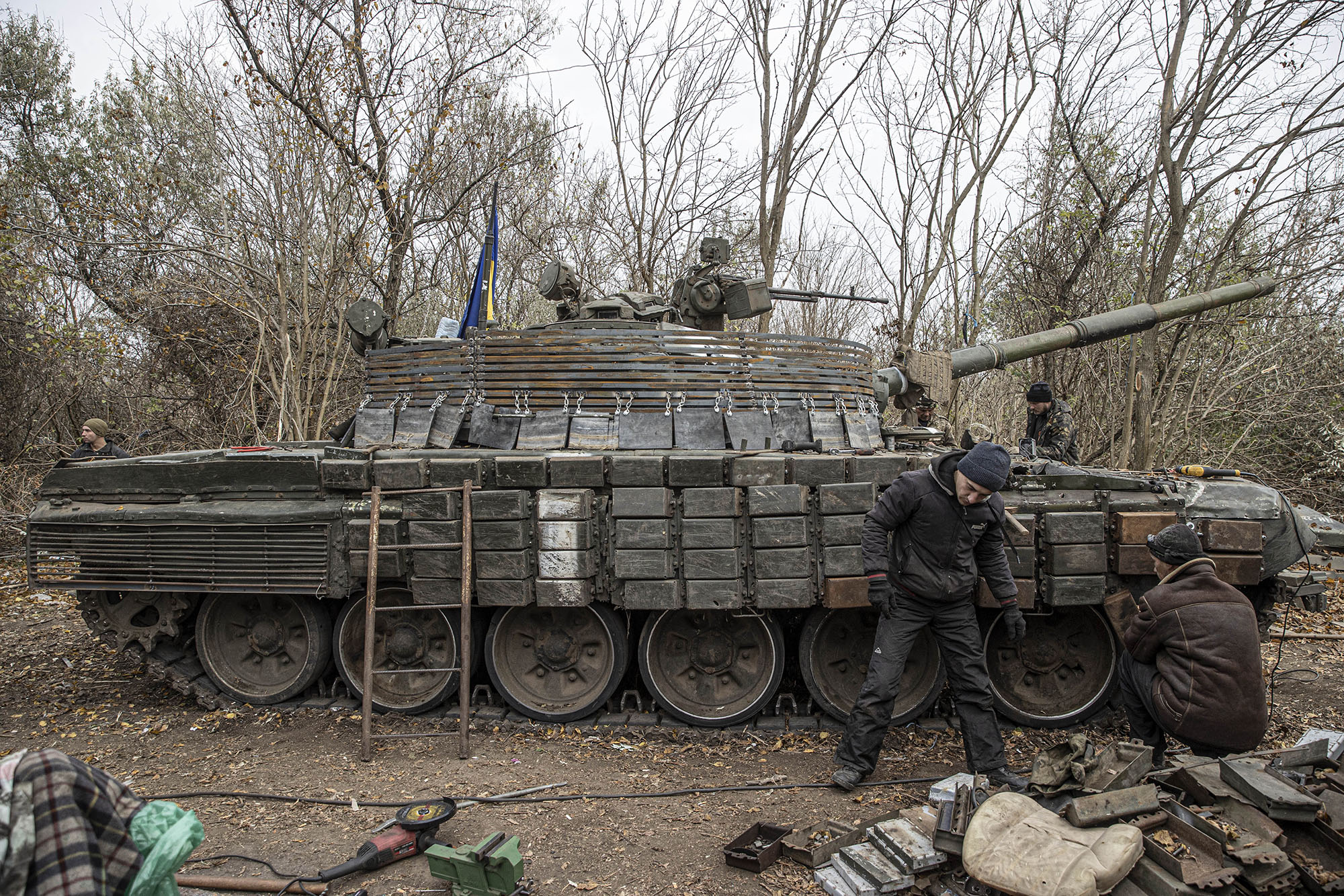 &nbsp;Ukrainian soldiers work repair a damaged tank as Ukrainian Armed Forces' military mobility continue toward Kherson front in Ukraine on Nov.&nbsp;9.&nbsp;