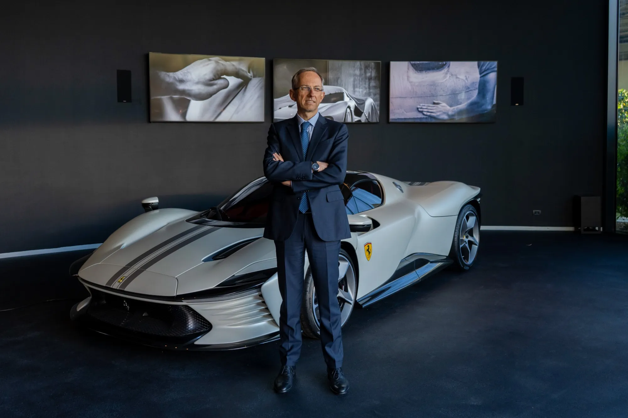Benedetto Vigna with a Ferrari Daytona SP3 sports car.