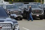 A person looks at vehicles for sale at a General Motors Co. Buick and GMC car dealership in Woodbridge, New Jersey on May 20.&nbsp;