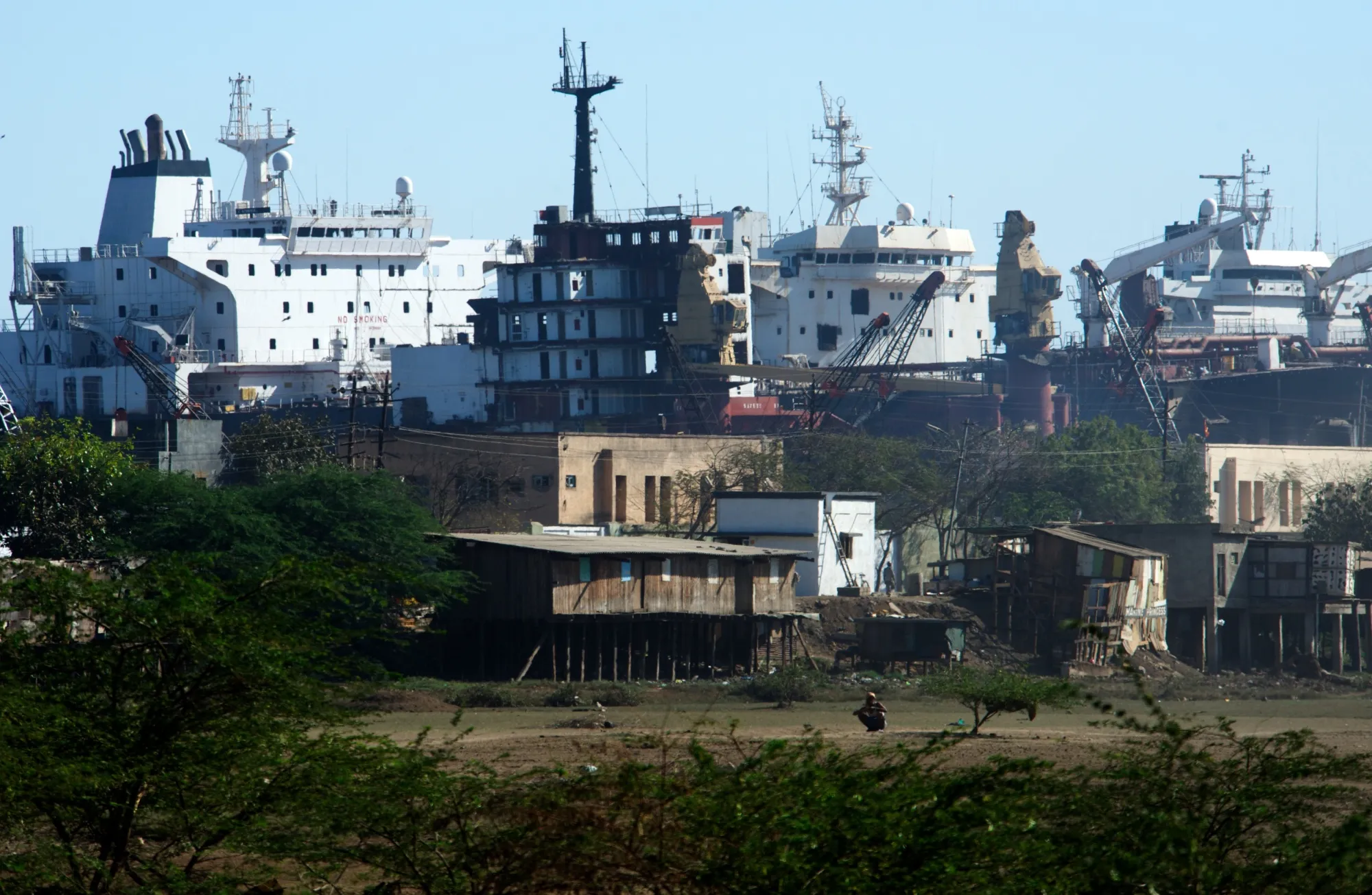 Ships waiting to be dismantled in a shipyard in Alang in Gujarat, India.