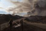 A firefighter works during the Route Fire in Castaic, California, on Aug. 31.