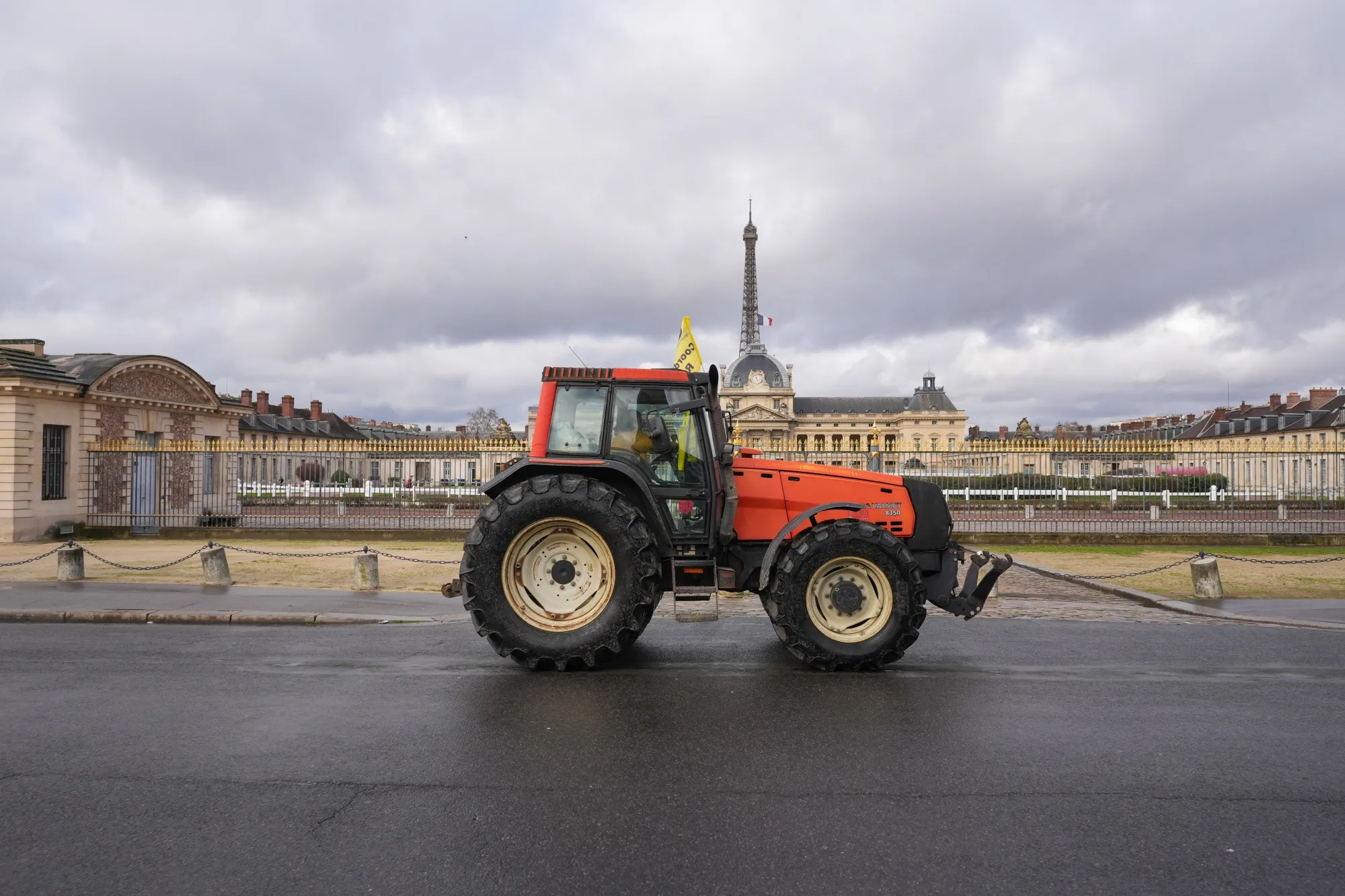 A French farmer drives a tractor towards Les Invalides during a protest in central Paris on Feb. 23. 2024.