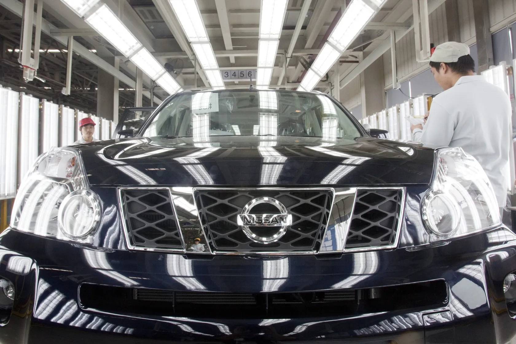 A Zhengzhou Nissan Automobile Co. Ltd. X-Trail sport utility vehicle (SUV) is inspected at the factory in Zhengzhou, Henan province, China, on Monday, Sept. 20, 2010.&nbsp;