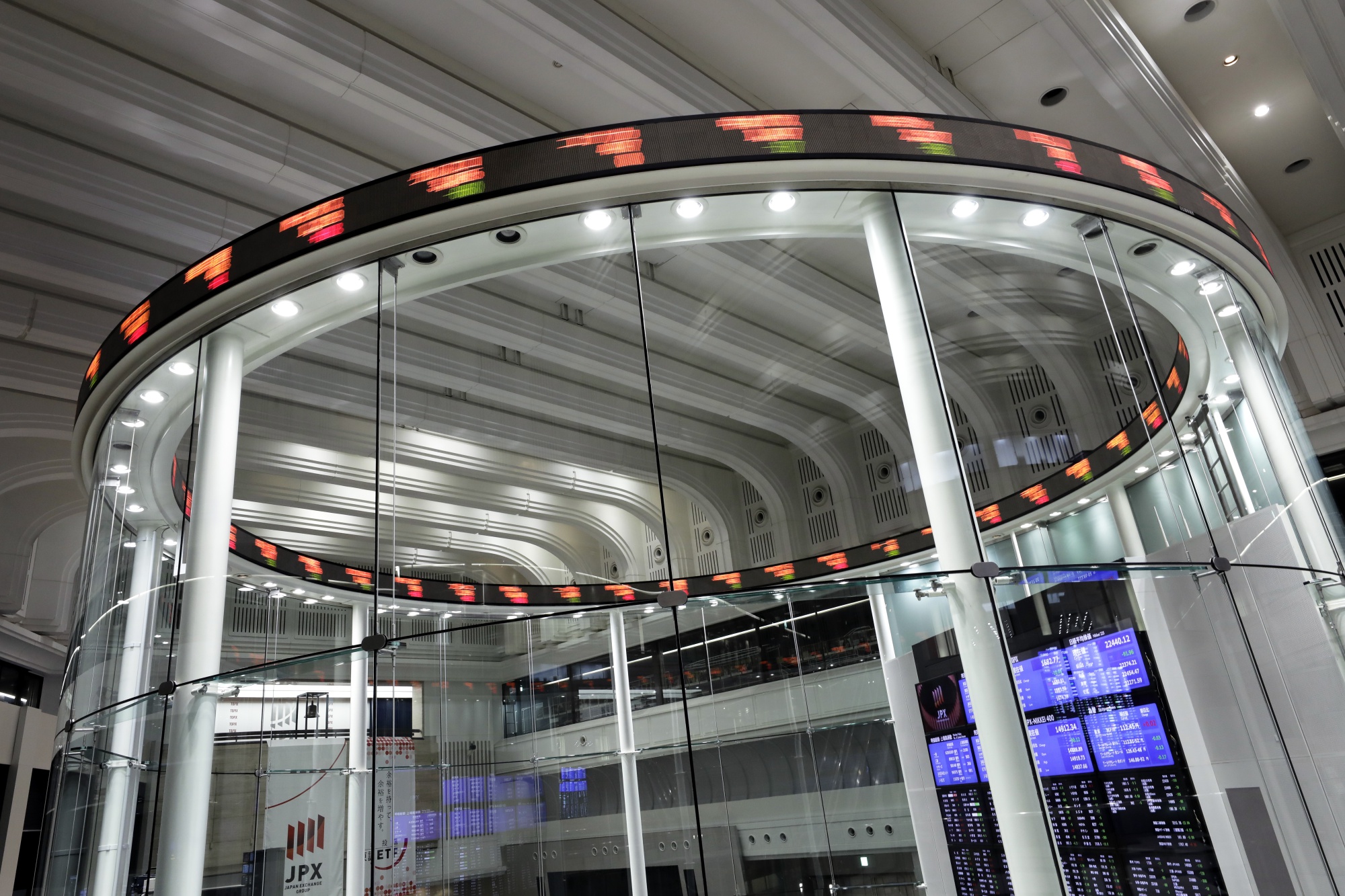 An electronic ticker is displayed at the Tokyo Stock Exchange.