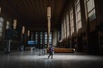 A man wearing a protective mask walks through an almost empty 30th Station in Philadelphia, Pennsylvania on April 15.