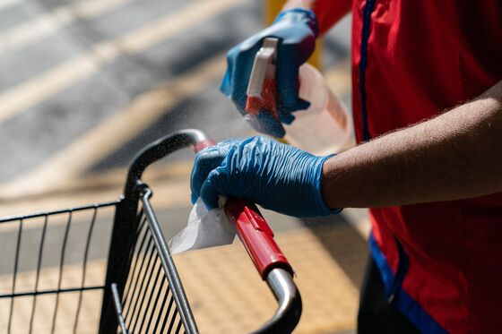 Sneeze Guards and Temperature Checks Are the New Normal for U.S. Retail