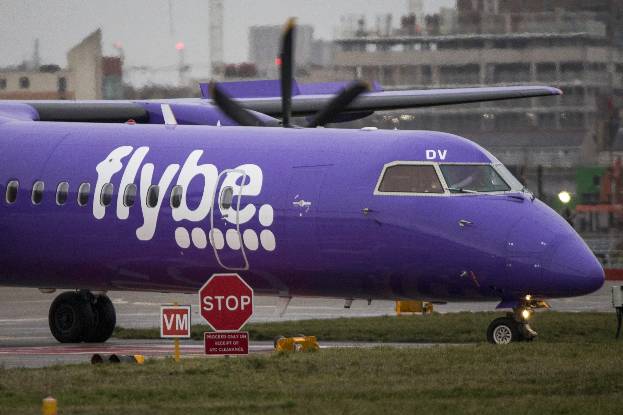 A passenger aircraft, operated by Flybe, on&nbsp;the tarmac at London City Airport in London.