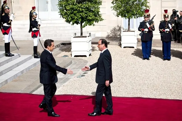 Nicolas Sarkozy, left, welcomes his successor Francois Hollande, French president-elect, before his swearing-in ceremony in Paris on May 15, 2012