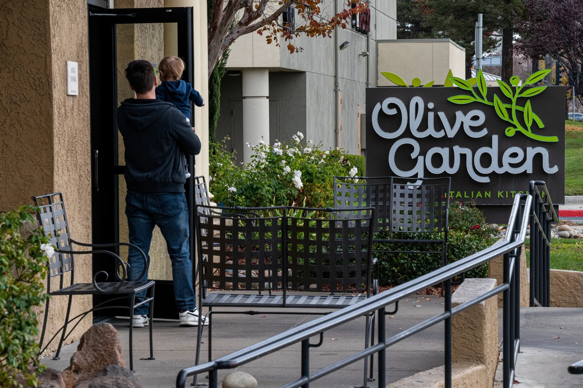 Customers enter an Olive Garden restaurant in Pittsburg, California.