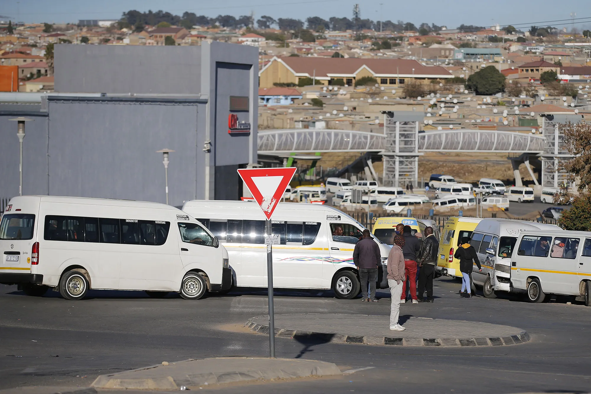 Taxi drivers block the entrance to Birch Acres Mall in Tembisa, Johannesburg on July 14.