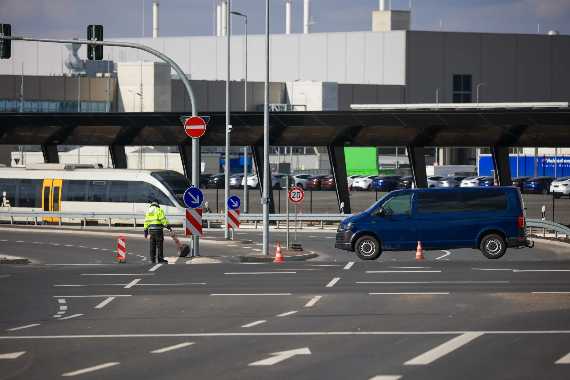 Security block an entrance to the Tesla Gigafactory in Gruenheide, Germany, on March 5.