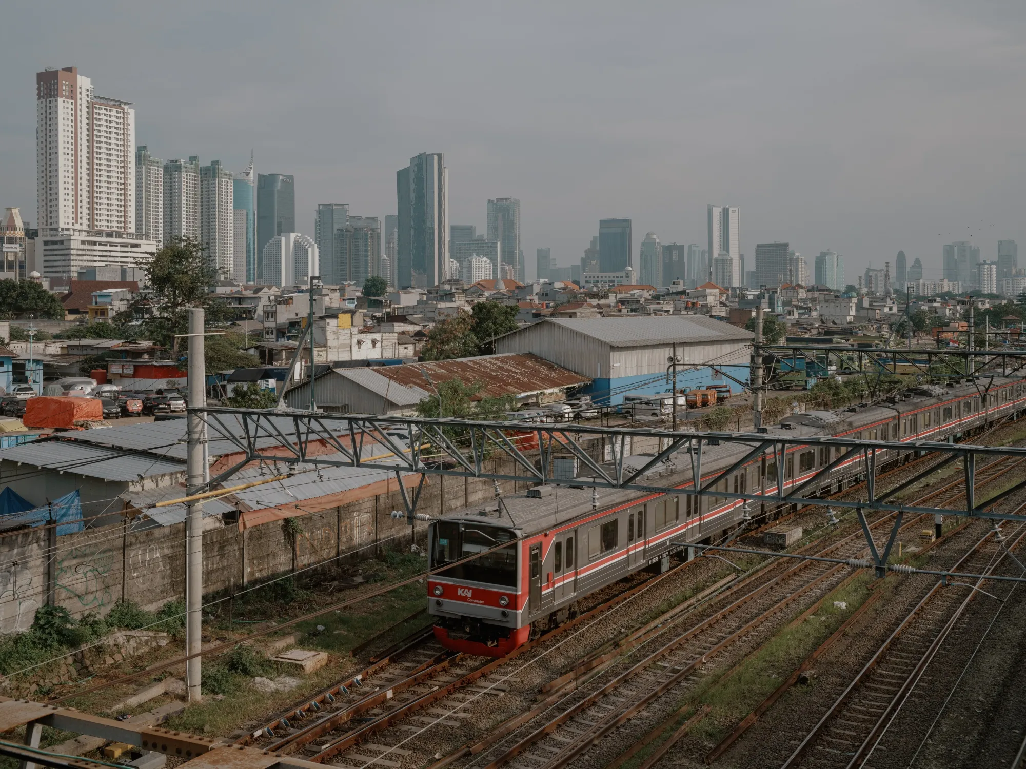 A train in front of the skyline of Jakarta, Indonesia.