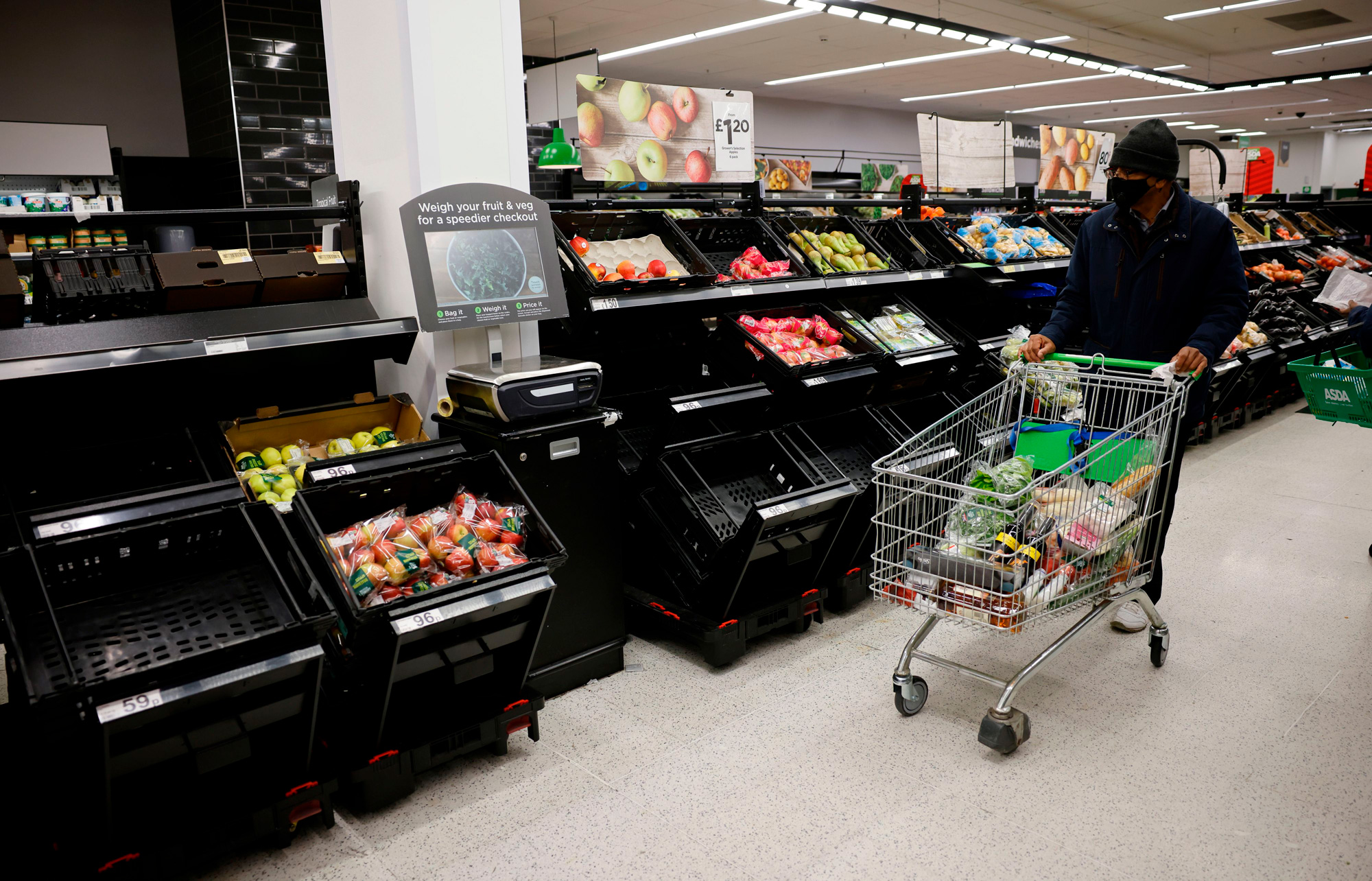 Empty produce shelves at a supermarket in London on Dec. 22.