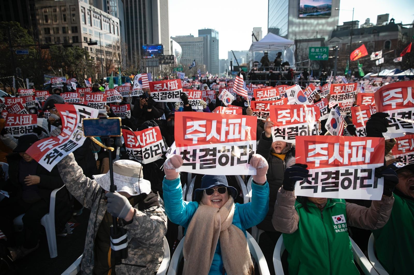 Supporters of South Korean President Yoon Suk Yeol at Gwanghwamun Square on Dec. 7.