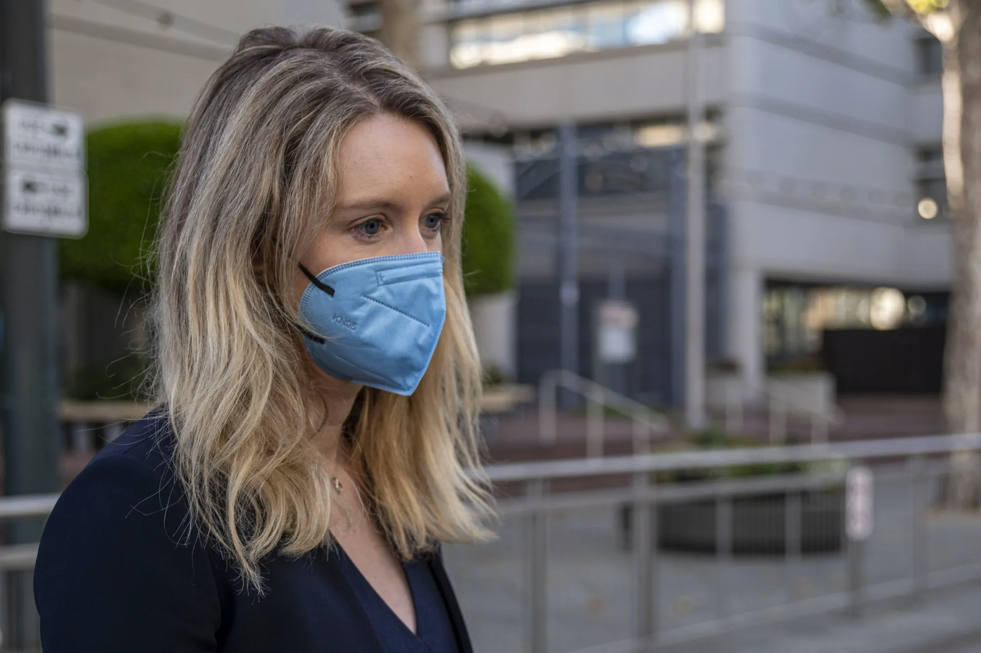 Elizabeth Holmes leaves federal court in San Jose, California, on Aug. 31.