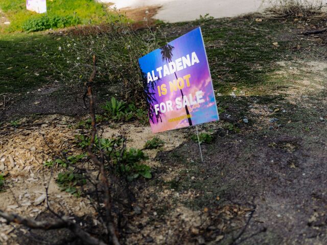 A sign reading ”Altadena is not for sale.”