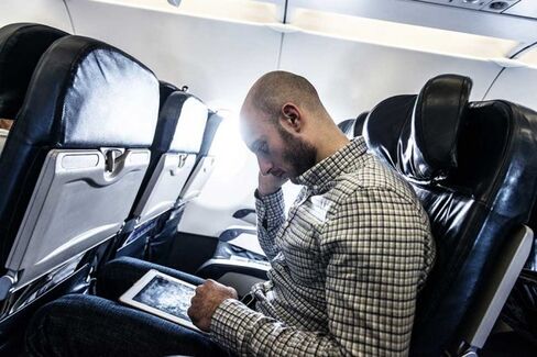 Airlines Need You (and Your Gadgets) to Kill Those Seat-Back Screens