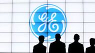 The General Electric Co. (GE) logo is displayed during the opening of the company's iCenter facility in Kuala Lumpur, Malaysia, on Tuesday, Oct. 21, 2014. GE surged the most in a year after beating analysts profit estimates as Chief Executive Officer Jeffrey Immelt squeezes more costs from the manufacturing units. Photographer: Goh Seng Chong/Bloomberg