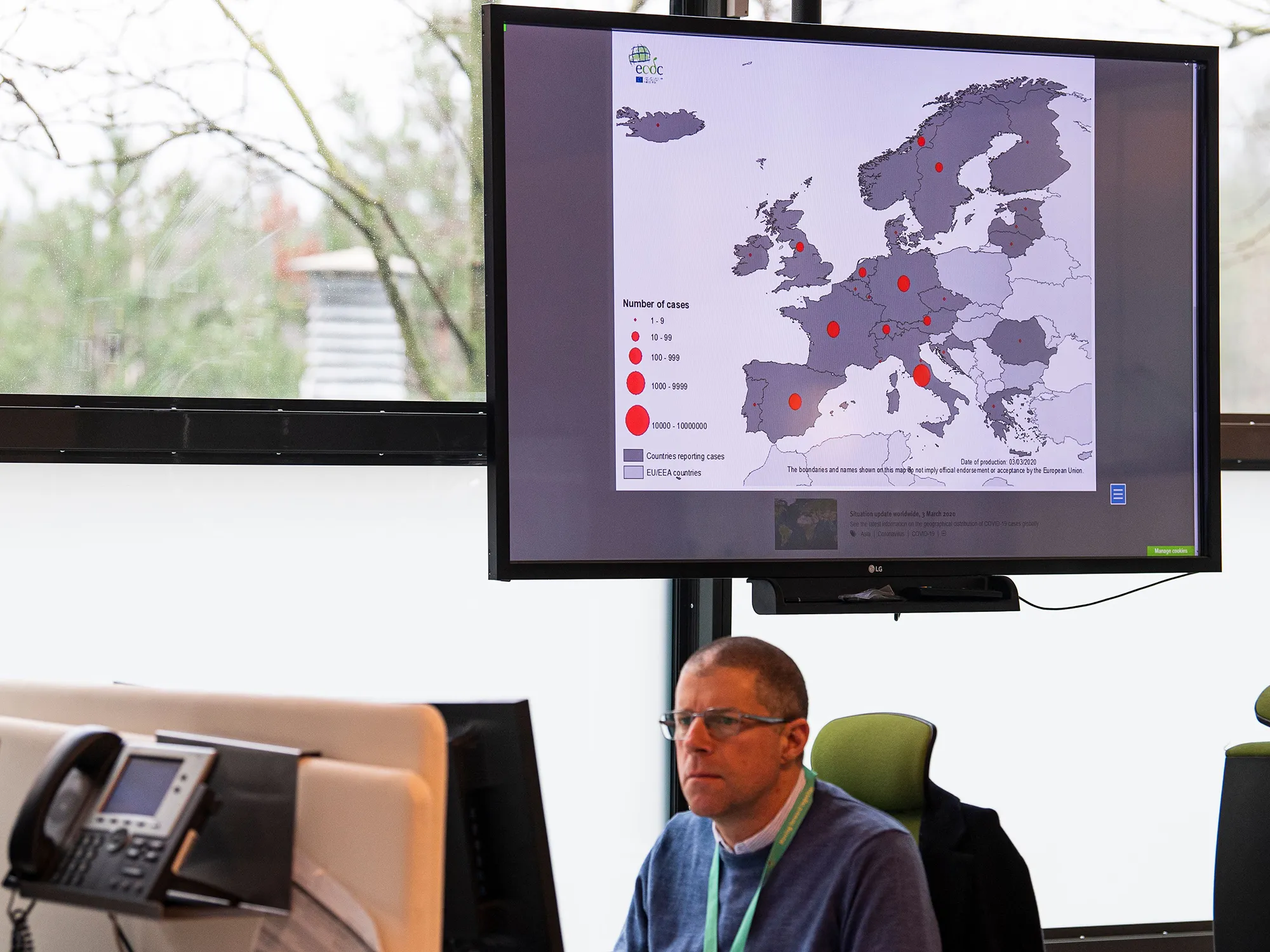 A monitor shows a map with number of cases of the COVID-19 Coronavirus as a man works at the Emergency Operations Centre in the European Centre for Disease Prevention and Control (ECDC) in Solna, Sweden on March 3.