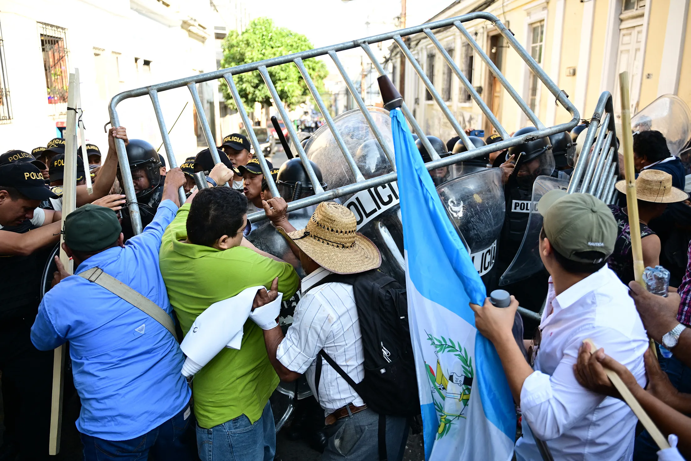 Supporters of Guatemala's President-elect&nbsp;Bernardo Arevalo&nbsp;clash with the police during a demonstration outside the Congress to protest against the suspension of the inauguration of the new legislature made by the Congress in Guatemala City on Jan.&nbsp;14.