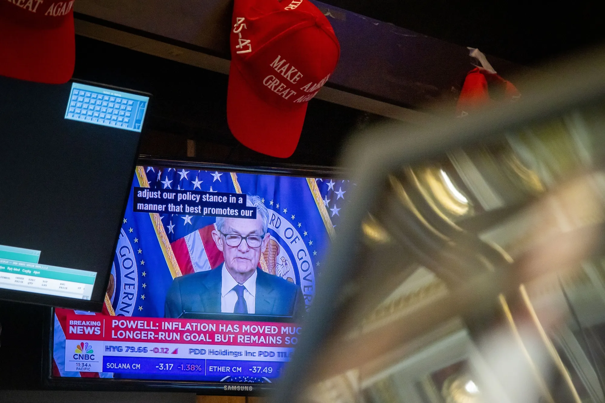 A television station broadcasts Jerome Powell at the NYSE.