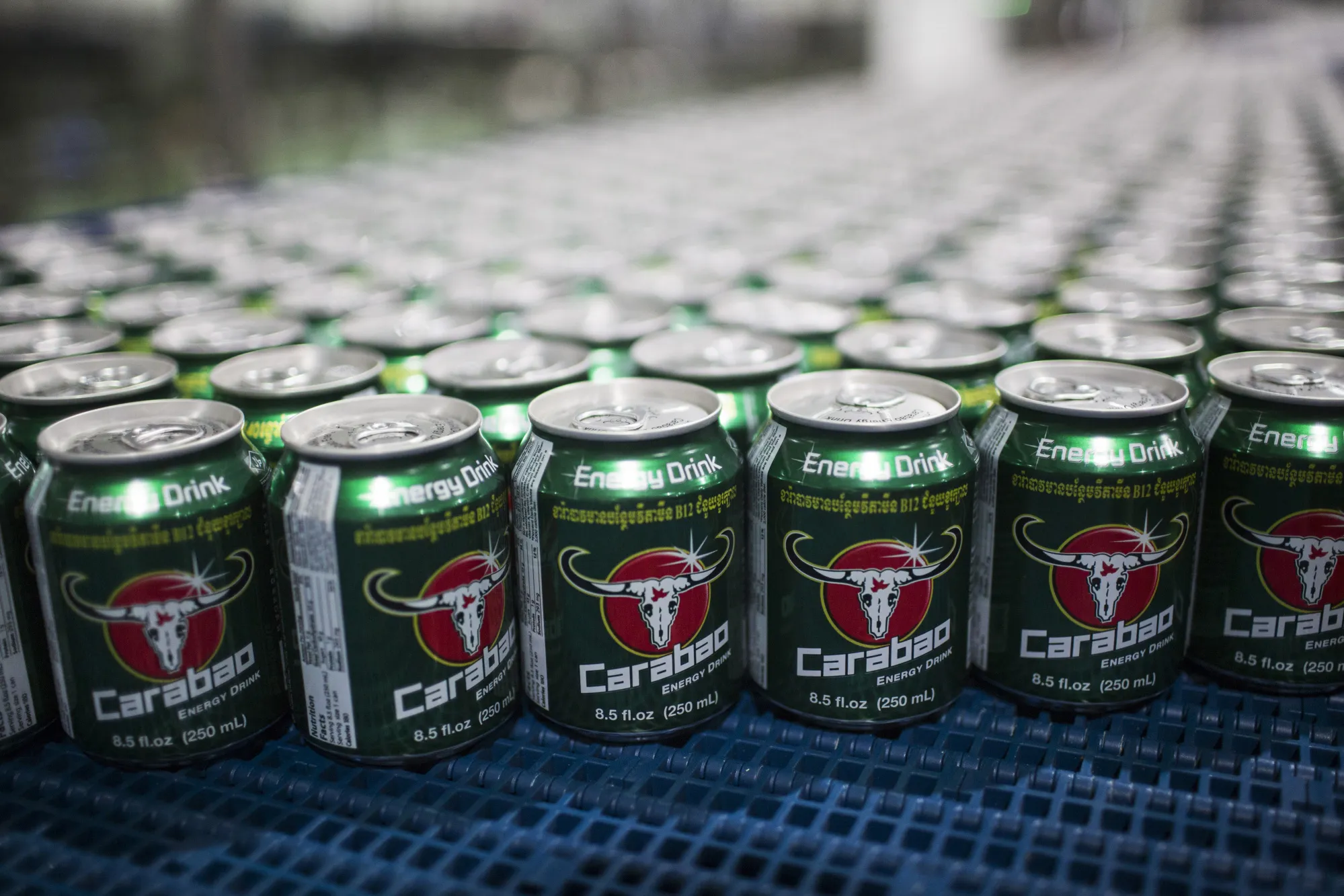 Cans of Carabao energy drink at a plant in Chachoengsao, Thailand.
