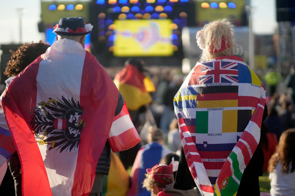 Fans watch the Eurovision Song Contest Semi-Final 2 on a screen in the Eurovision Village, in Liverpool, May 11.