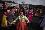 Students take part in a mass dance event during celebrations marking the anniversary of the birth of late North Korean leader Kim Il Sung in Pyongyang on April 15.