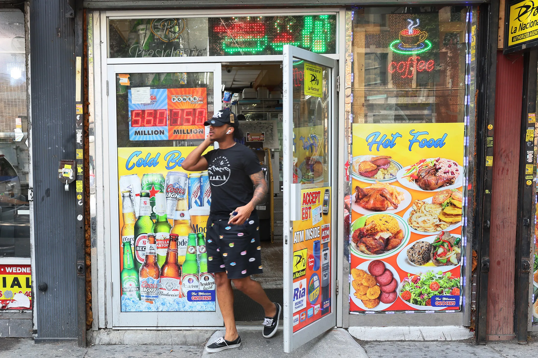 A customer leaves a bodega in the&nbsp;Brooklyn borough of New York.