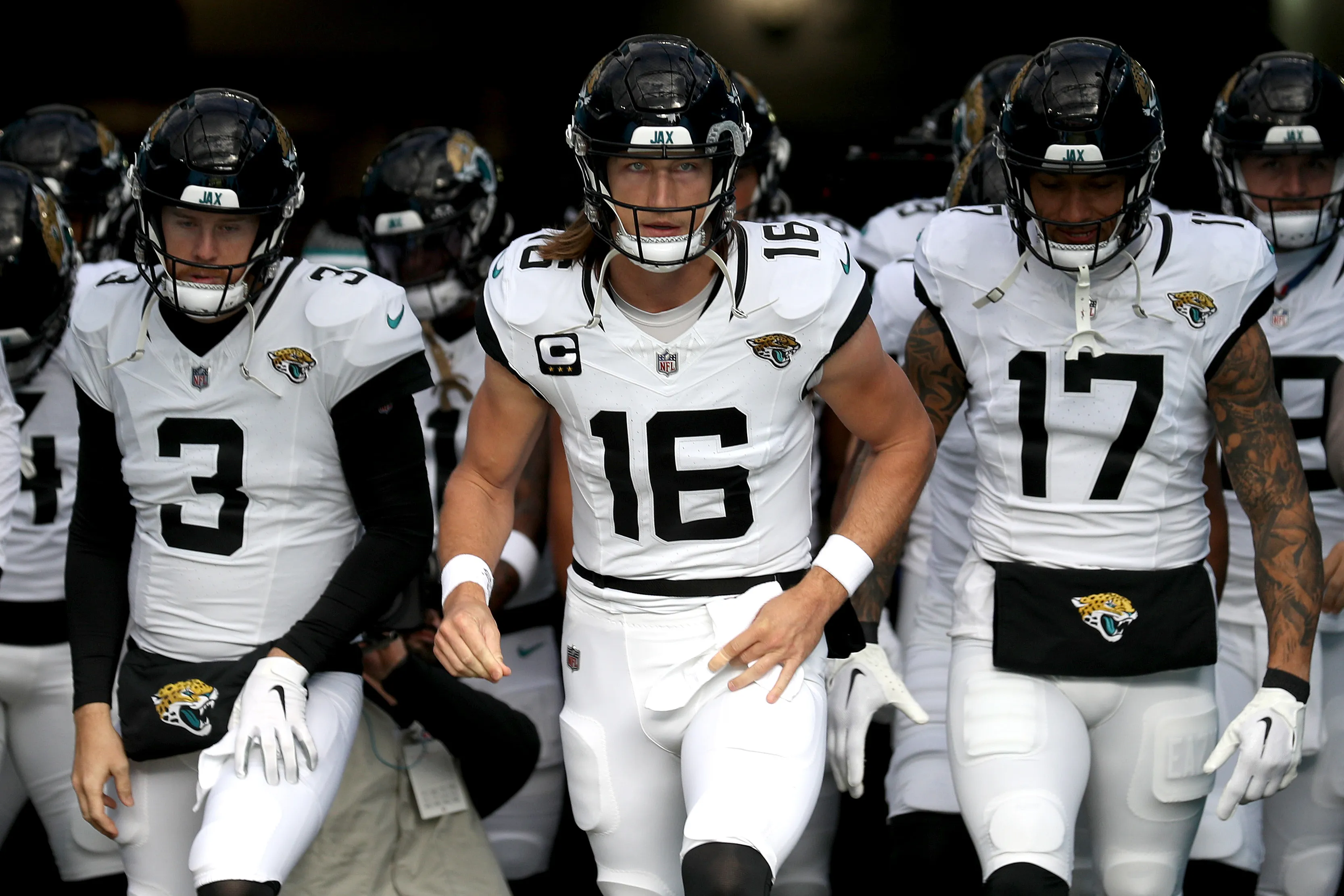 The Jacksonville Jaguars run onto the field before a game.
