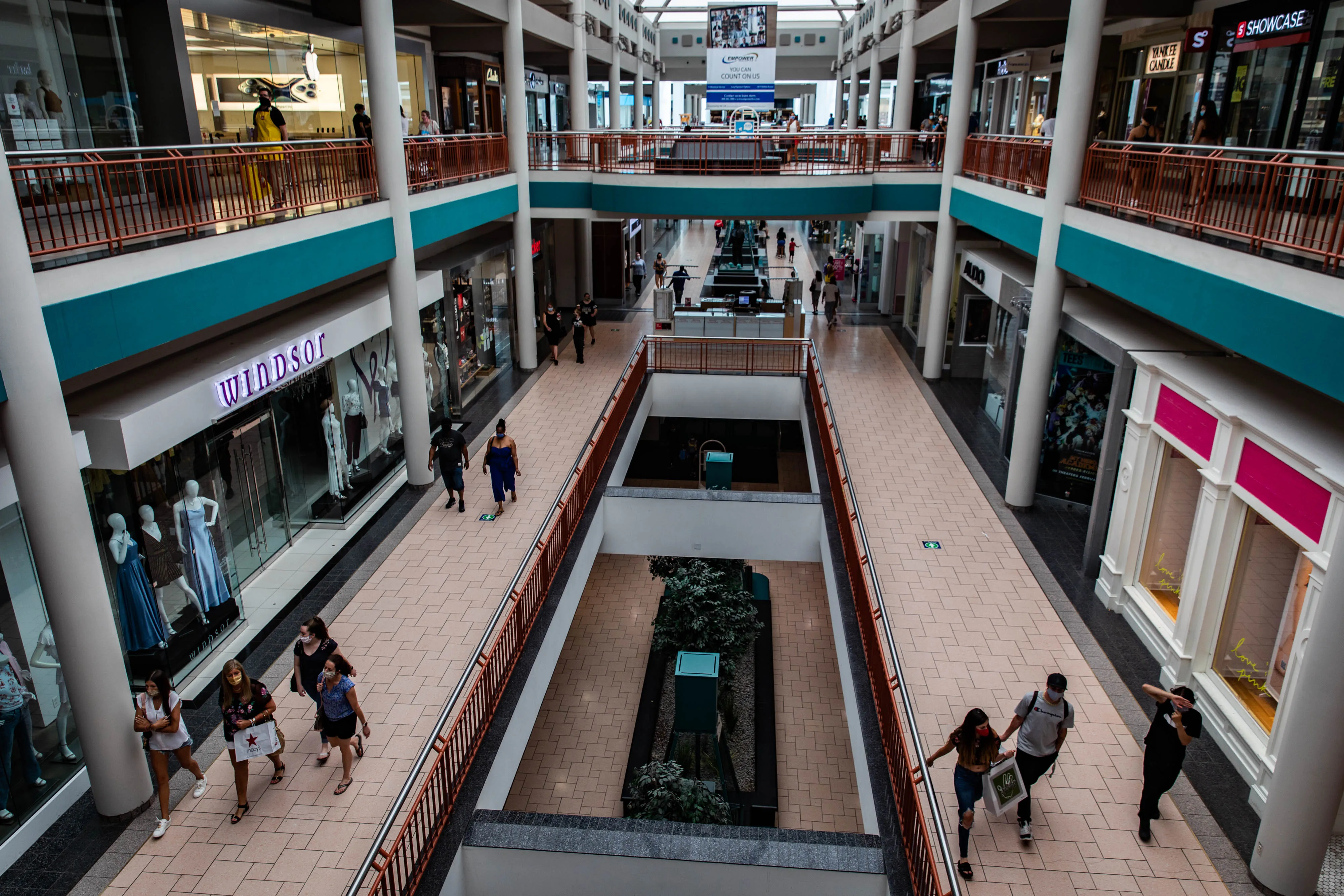 Shoppers walk through the Destiny USA mall in Syracuse.