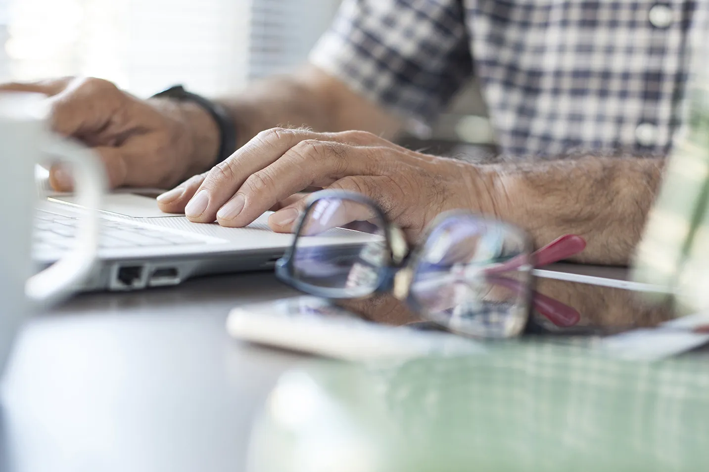 Senior man working on computer