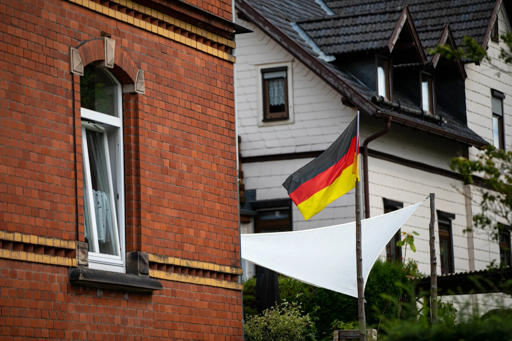 A German flag flies from the garden in the center of Sonneberg.