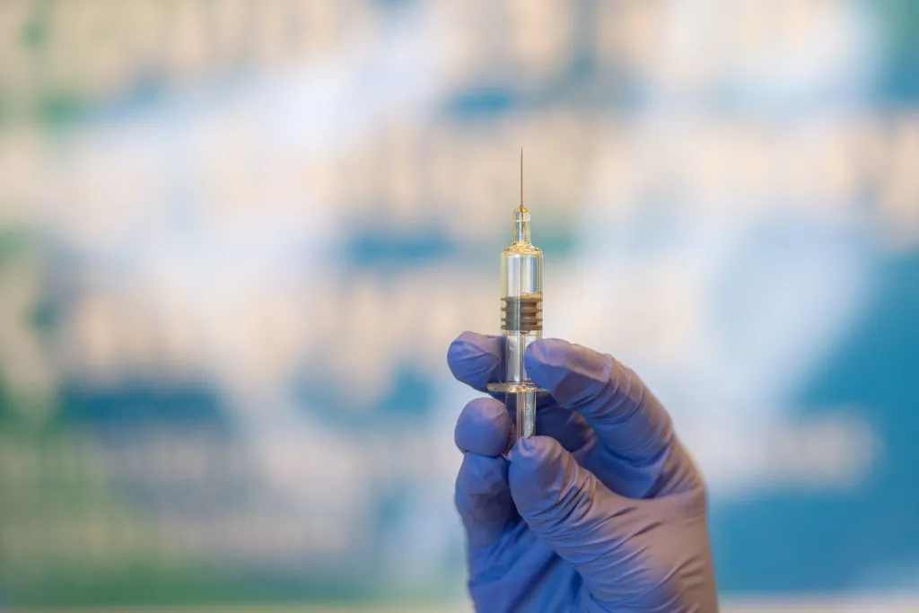 A Covid-19 vaccine is a key step toward a return to normal. How we get there may make all the difference.